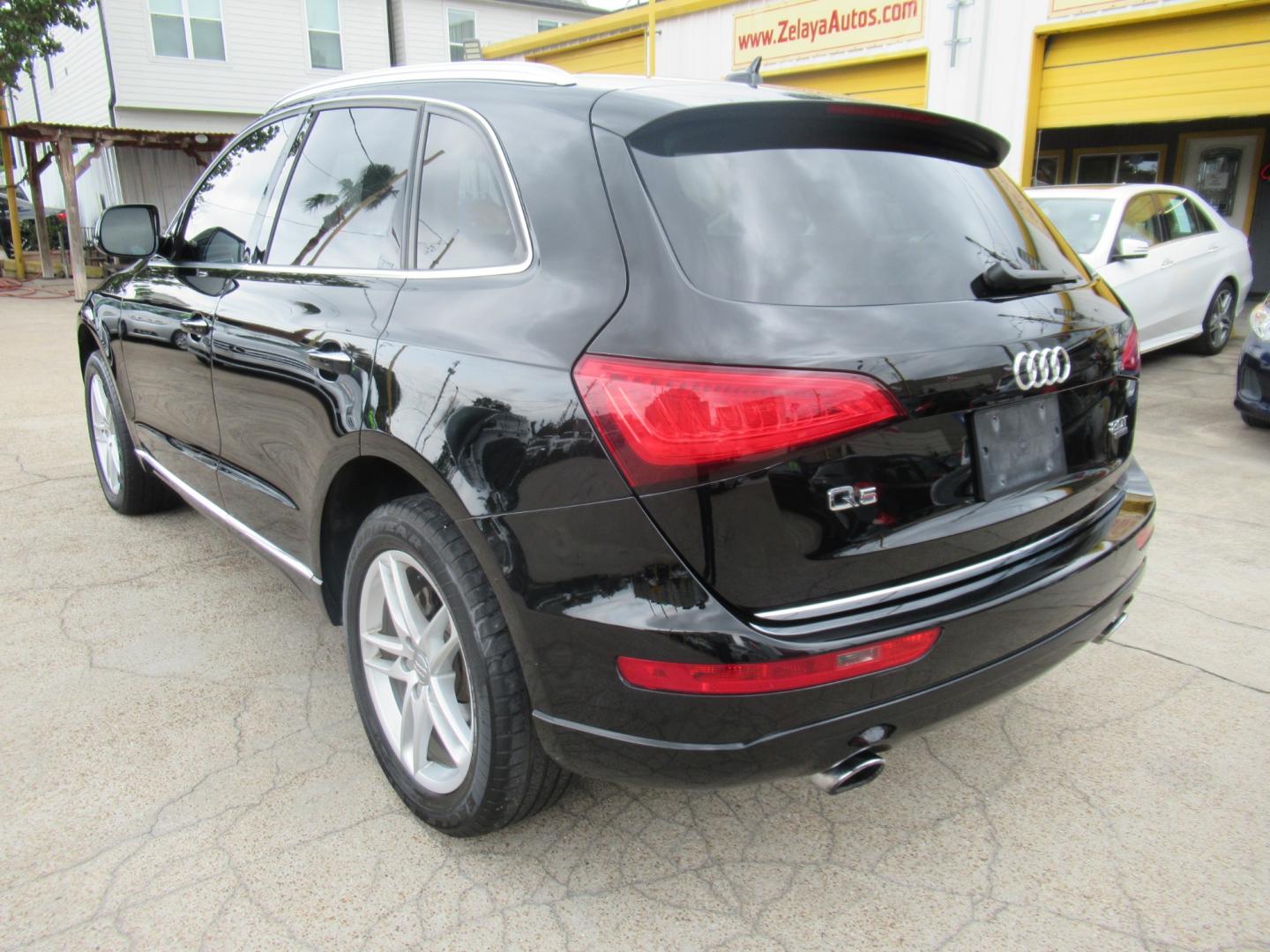 2015 Black /Black Audi Q5 PREMIUM PLUS (WA1LFAFP4FA) with an 2.0L I4 F DOHC 16V engine, Automatic transmission, located at 1511 North Shepherd Dr., Houston, TX, 77008, (281) 657-1221, 29.798361, -95.412560 - 2015 AUDI Q5 2.0T QUATTRO PREMIUM PLUS VIN: WA1LFAFP4FA145528 W A 1 L F A F P 4 F A 1 4 5 5 2 8 4 DOOR WAGON/SPORT UTILITY 2.0L I4 F DOHC 16V FLEX FUEL ALL WHEEL DRIVE - Photo#22